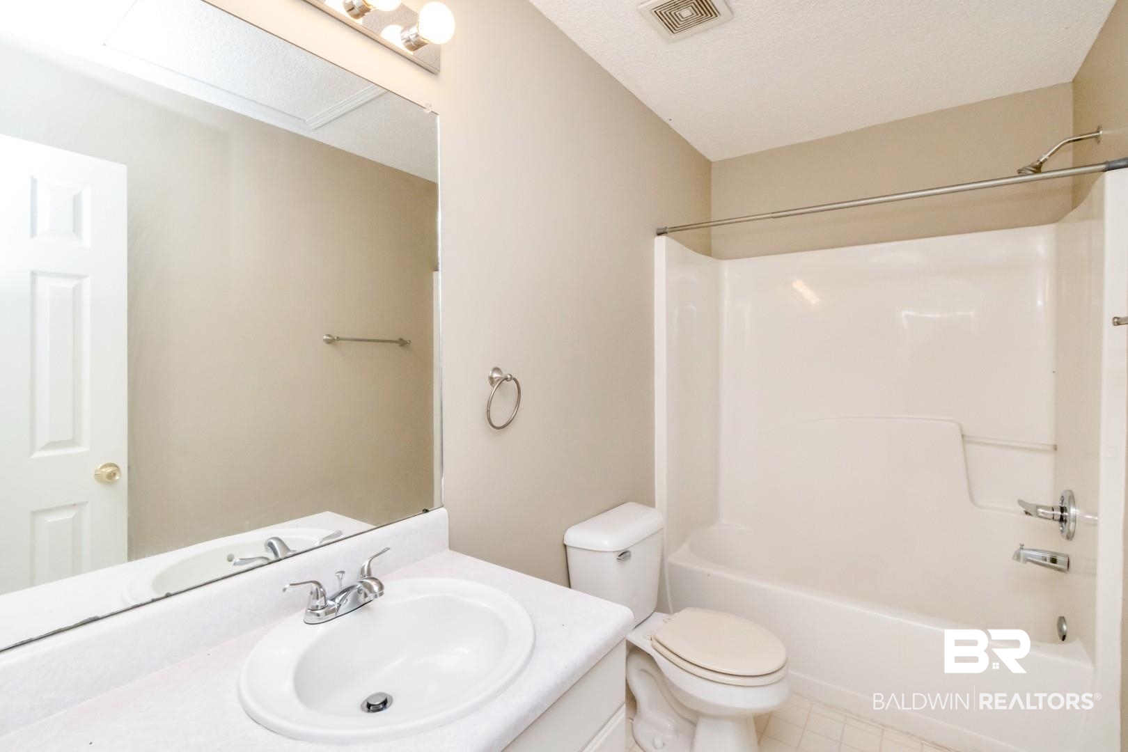 6482 Cedar Bend Court Mobile, AL 36608 - Photo 19 of 26 Bathroom featuring bathing tub / shower combination, vanity, and tile patterned flooring