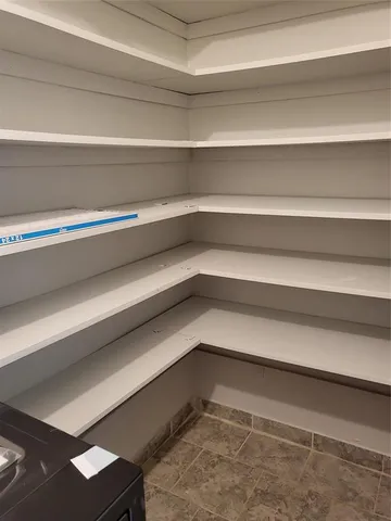 a kitchen with a stove and a microwave