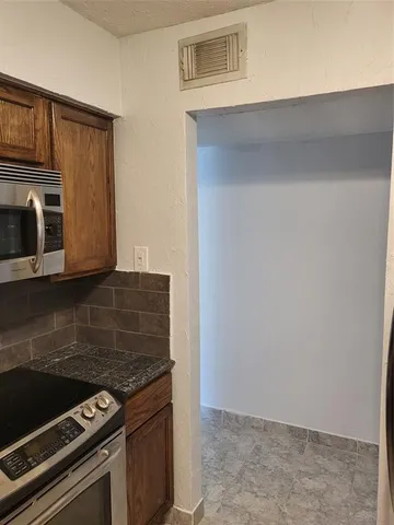 a utility room with a washer and dryer