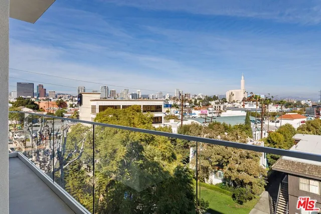 a view of a city from a balcony