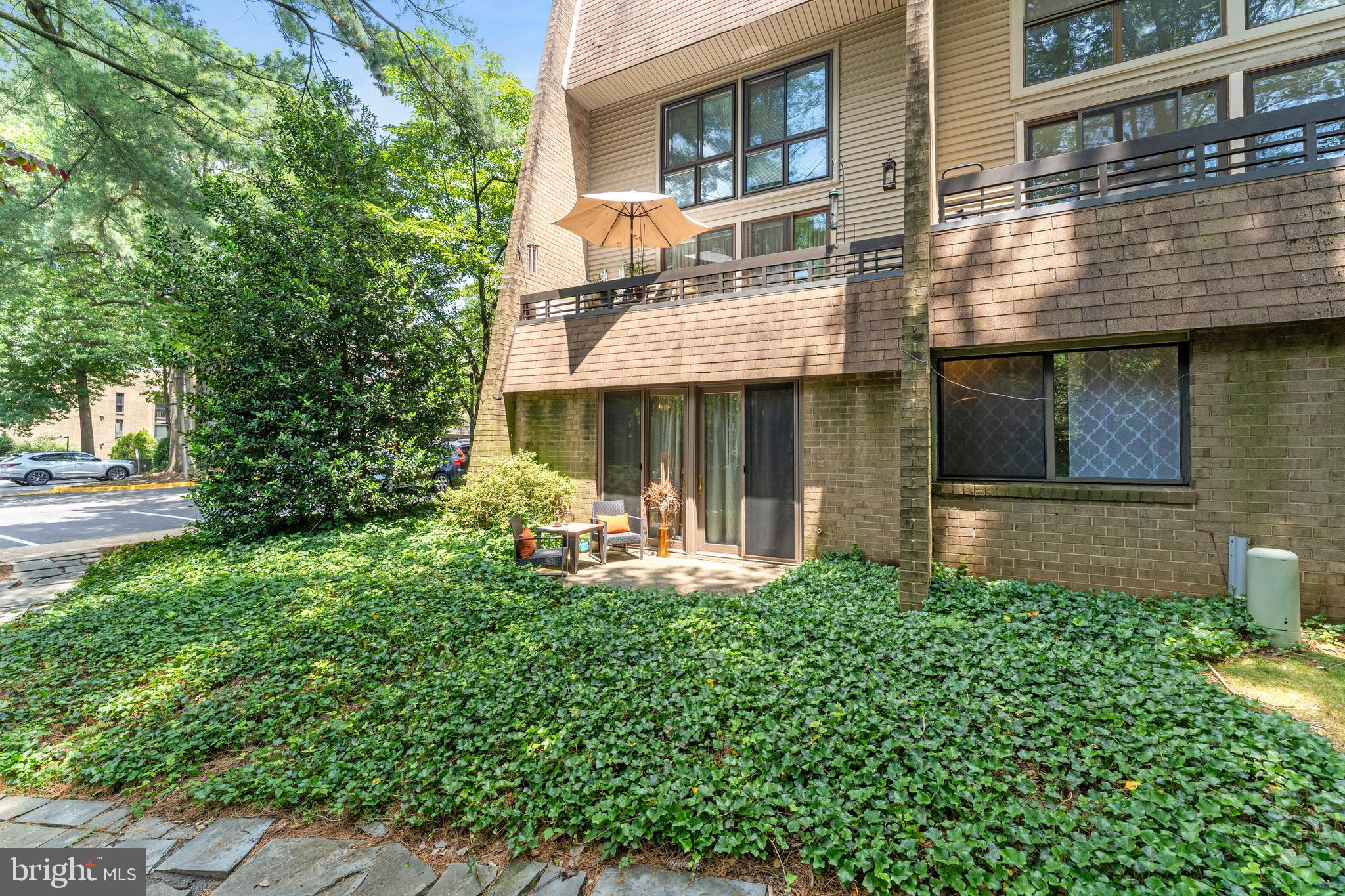 11617 Windbluff Court, Unit 9B Reston, VA 20191 - Photo 37 of 46 Rear view of the patio