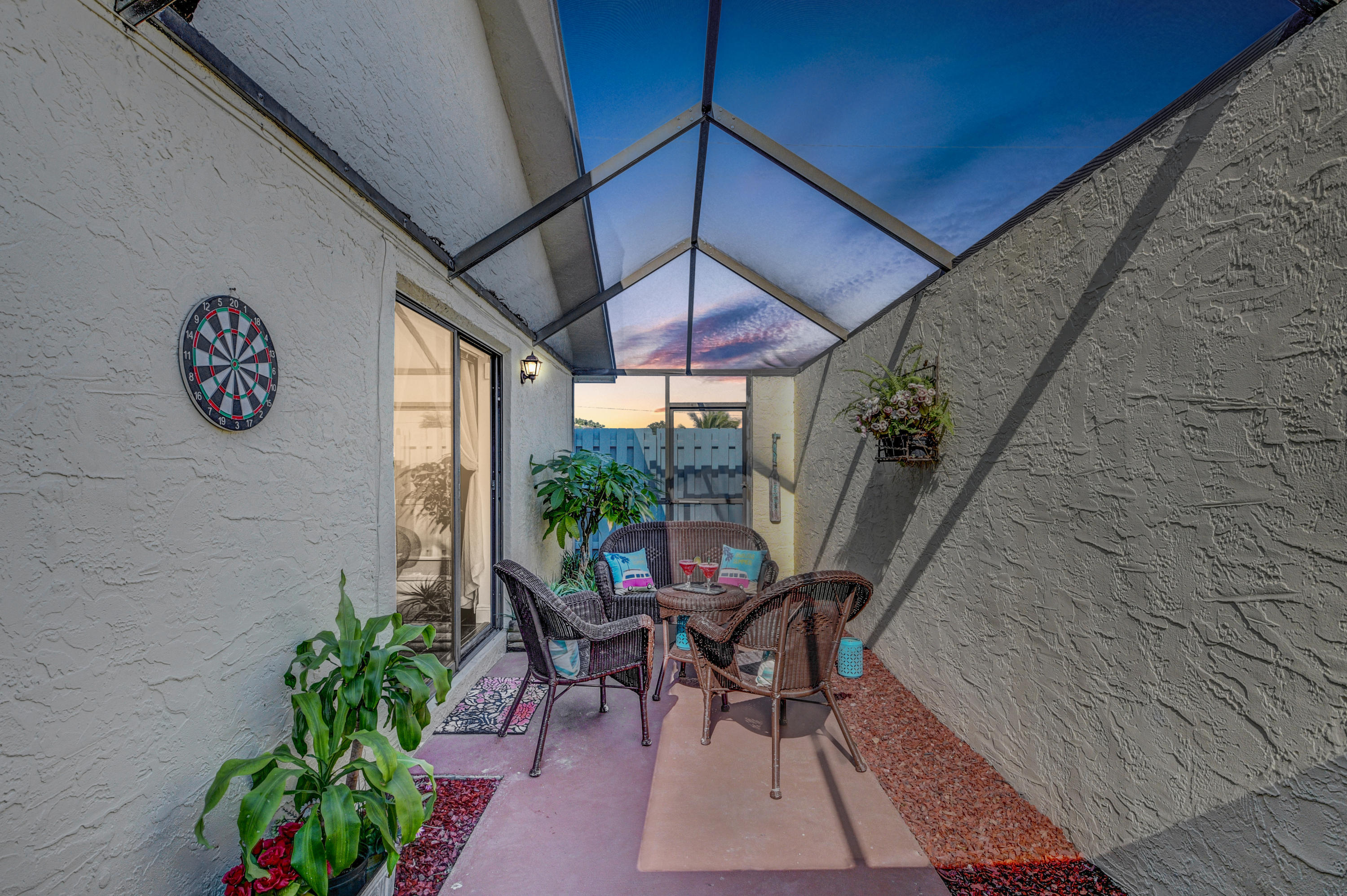 9193 Southwest 20th Street, Unit E Boca Raton, FL 33428 - Photo 43 of 56 Twilight Fun Patio