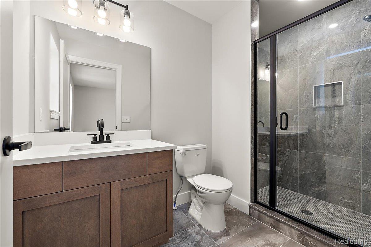 53650 Romeo Plank Road Macomb, MI 48042 - Photo 36 of 64 Bathroom with vanity and walk in shower