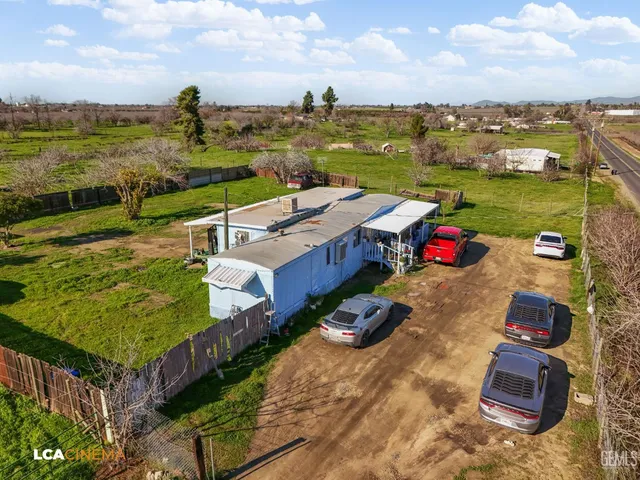 a view of a city with lawn chairs