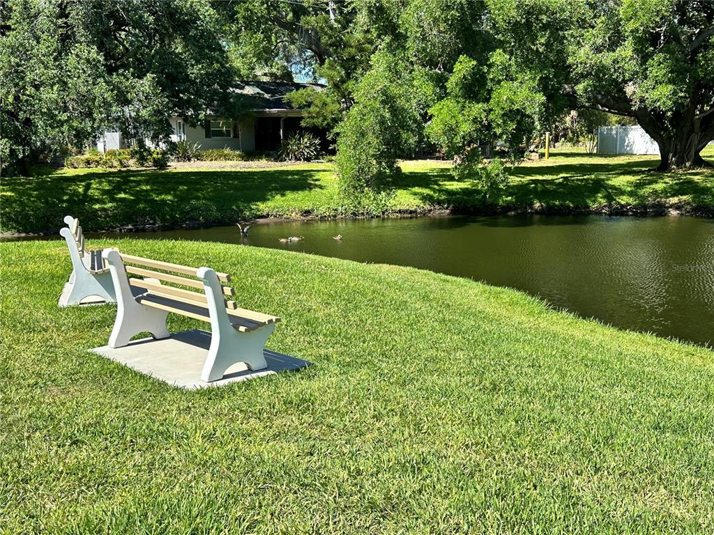 2829 74th Street West, Unit 2829 Bradenton, FL 34209 - Photo 23 of 27 a view of a house with a yard