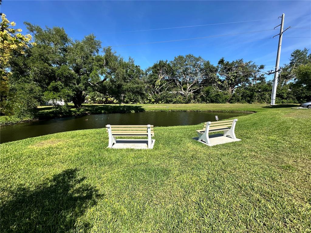 2829 74th Street West, Unit 2829 Bradenton, FL 34209 - Photo 24 of 27 a view of a lake with a park