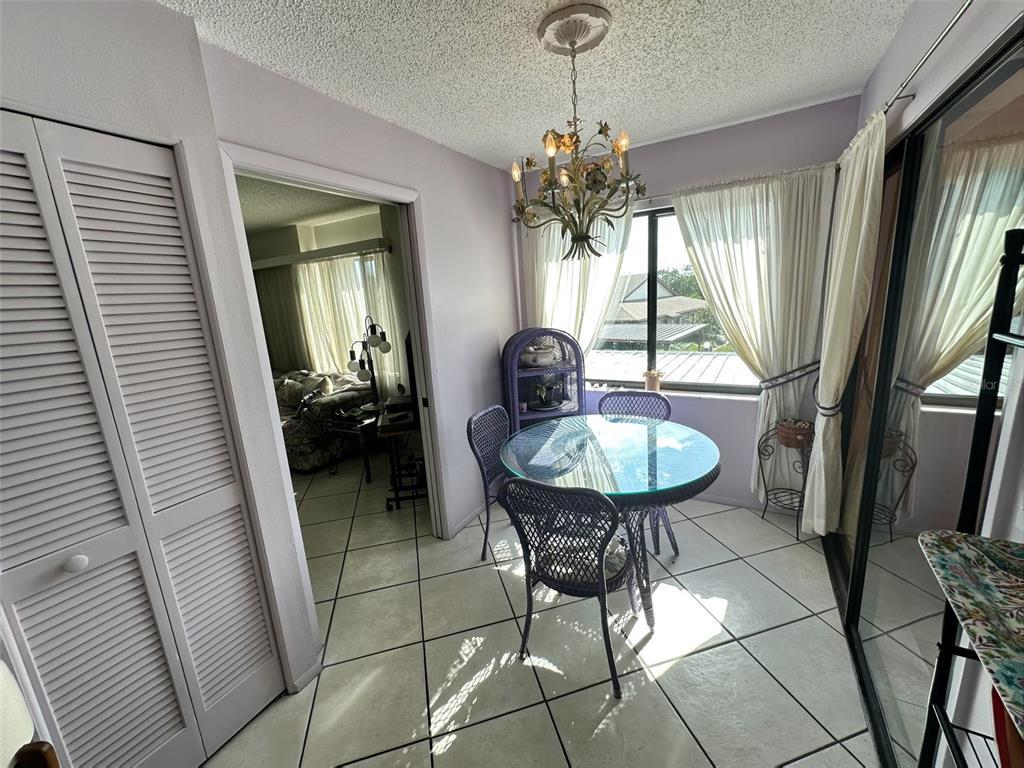 2829 74th Street West, Unit 2829 Bradenton, FL 34209 - Photo 8 of 27 a view of a livingroom with furniture and window