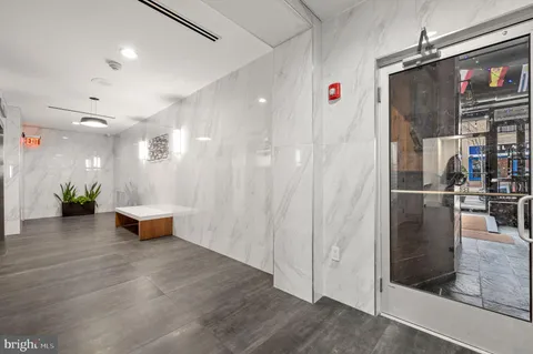 a bathroom with a shower and a tub