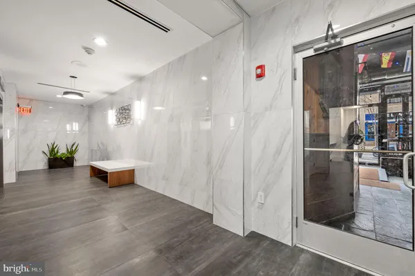 a bathroom with a shower and a tub