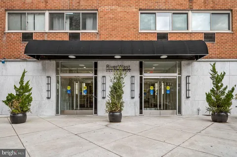 a view of a building with car