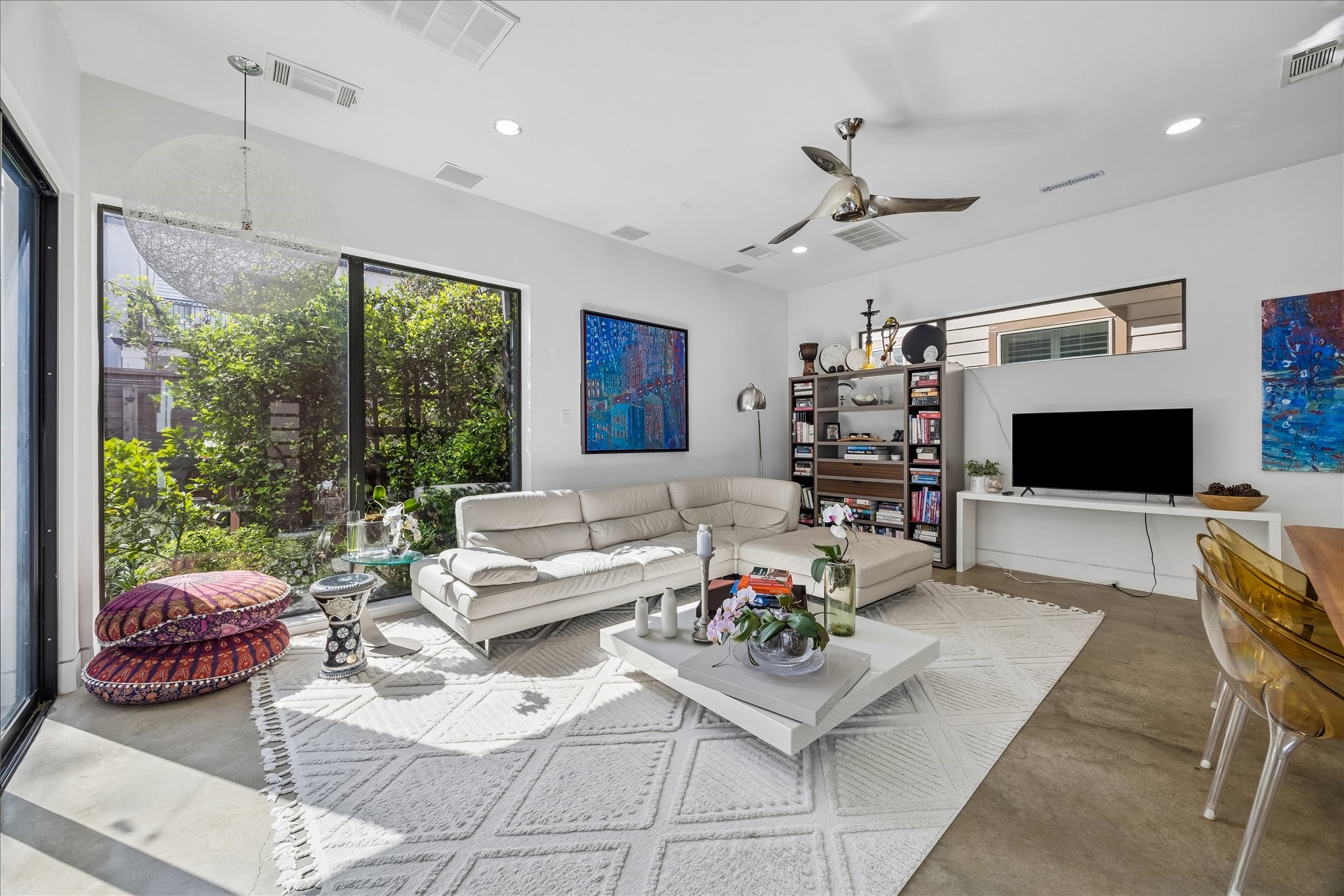 2014 Park Street Houston, TX 77019 - Photo 10 of 40 What a fantastic family room. Abundant natural lighting and views bringing nature into the home.