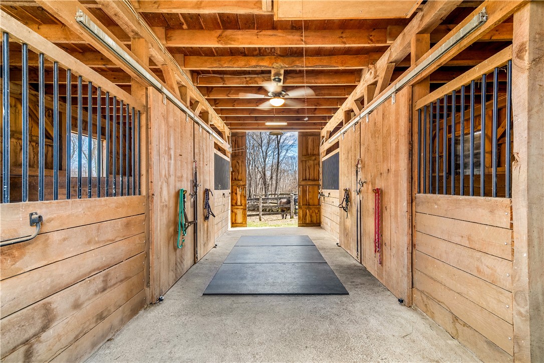 613 Slocum Road Exeter, RI 02874 - Photo 36 of 43 4 stall barn w/tack area with hay loft.