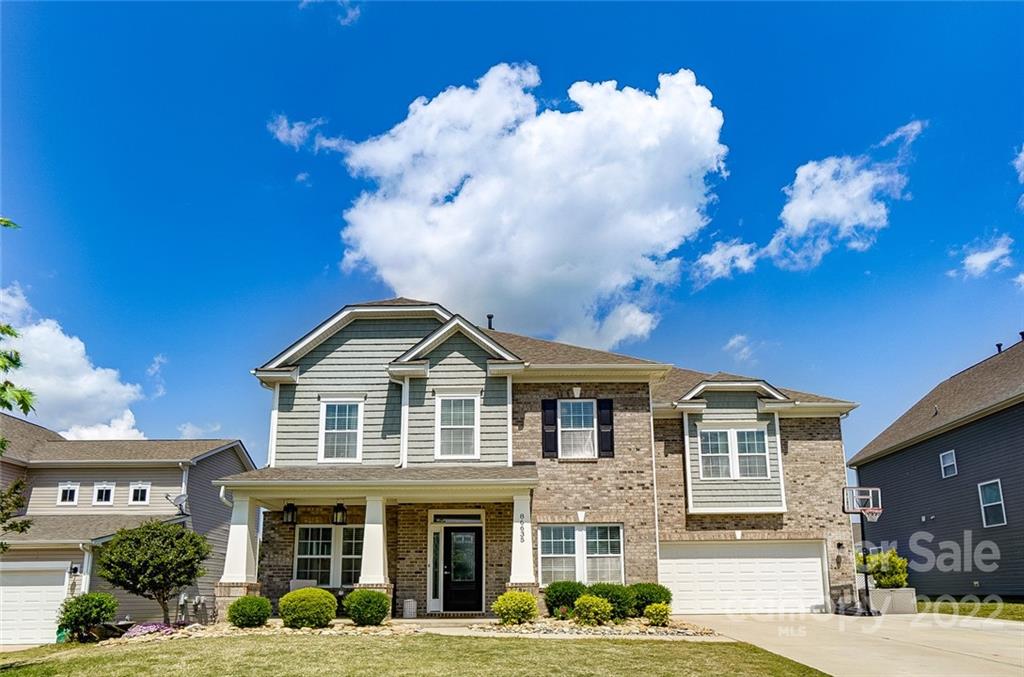 86635 Arrington Road, Unit 116 Lancaster, SC 29720 - Photo 1 of 37 a front view of a house with a yard