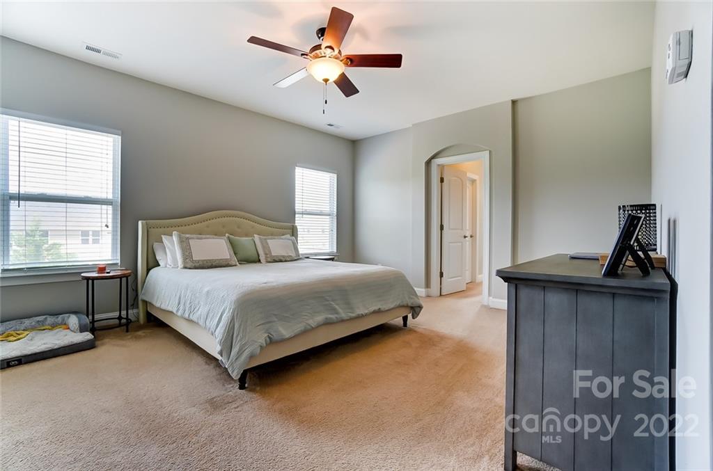 86635 Arrington Road, Unit 116 Lancaster, SC 29720 - Photo 19 of 37 a bedroom with a bed dresser and a window