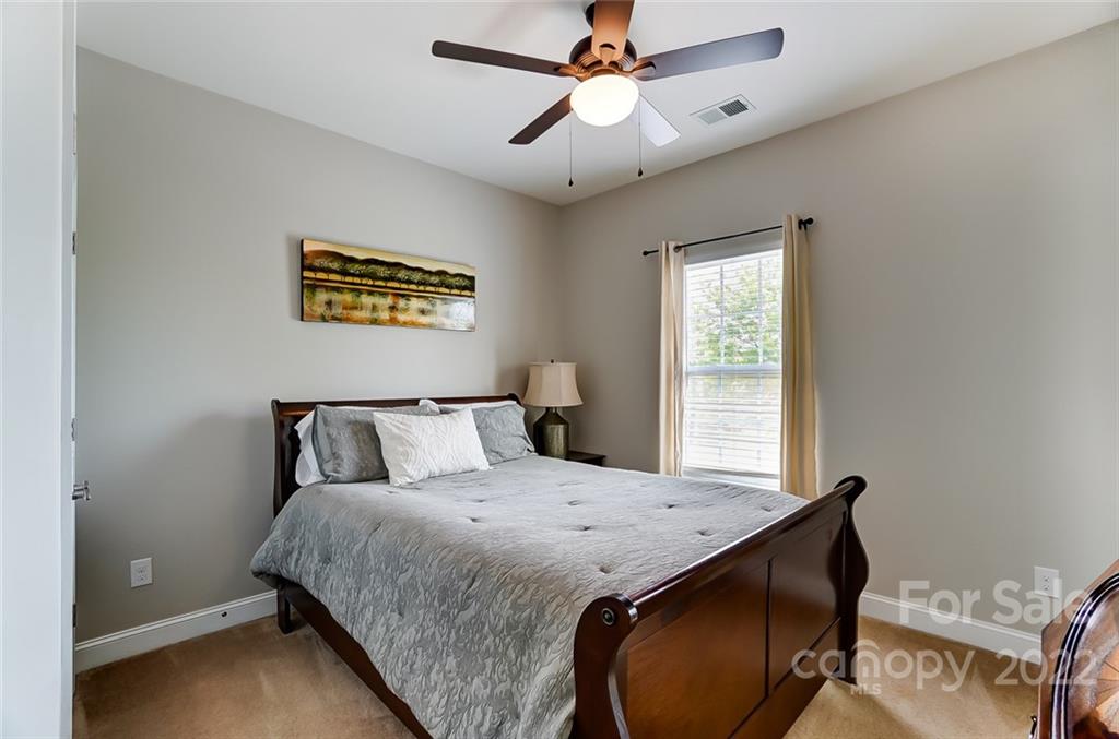 86635 Arrington Road, Unit 116 Lancaster, SC 29720 - Photo 25 of 37 a bedroom with a bed and a window