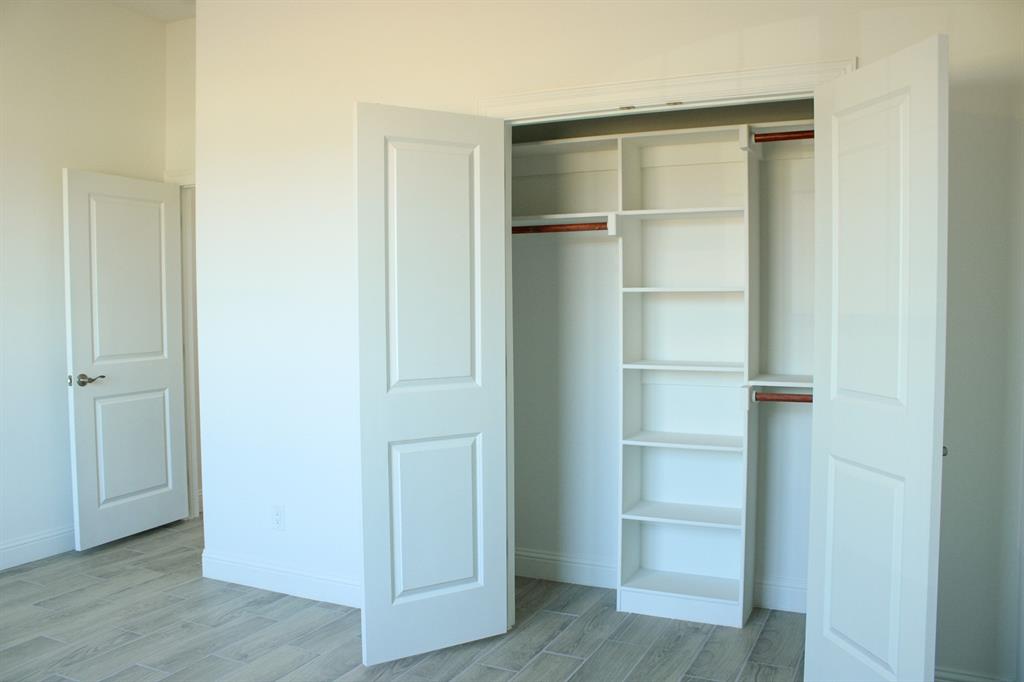 102 Country Road 4511 Decatur, TX 76234 - Photo 22 of 34 a view of an empty walk in closet