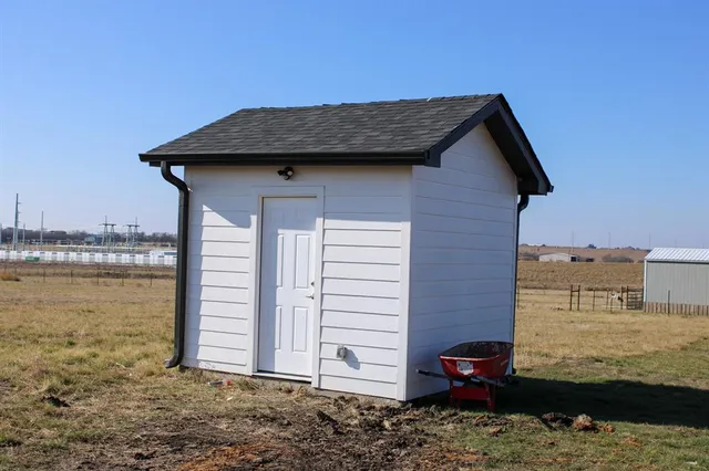 a view of a house with roof deck