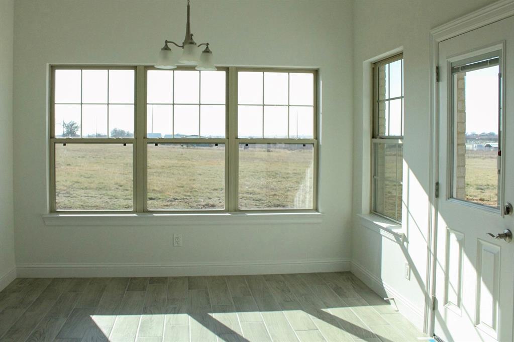 102 Country Road 4511 Decatur, TX 76234 - Photo 7 of 34 an empty room with a window