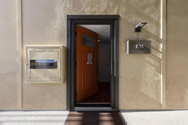 a view of a bathroom from a hallway
