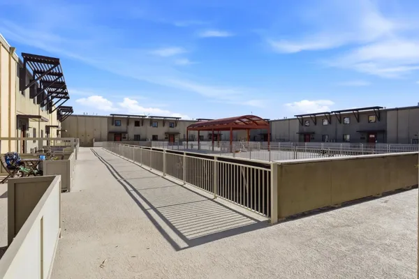 a picture of a bench in front of a window