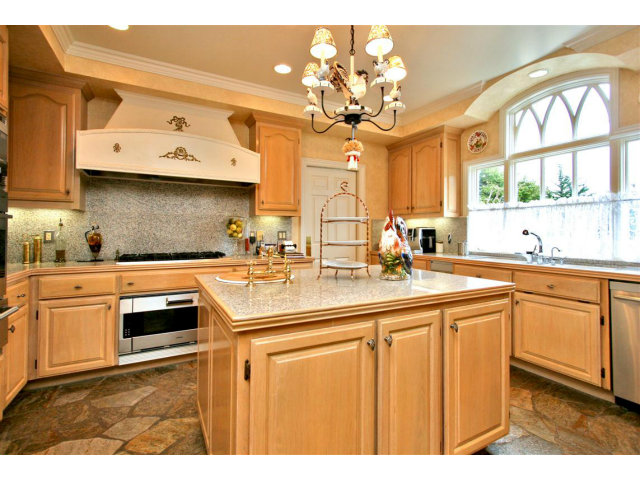 1440 Riata Road Pebble Beach, CA 93953 - Photo 3 of 9 a kitchen with a sink cabinets and window