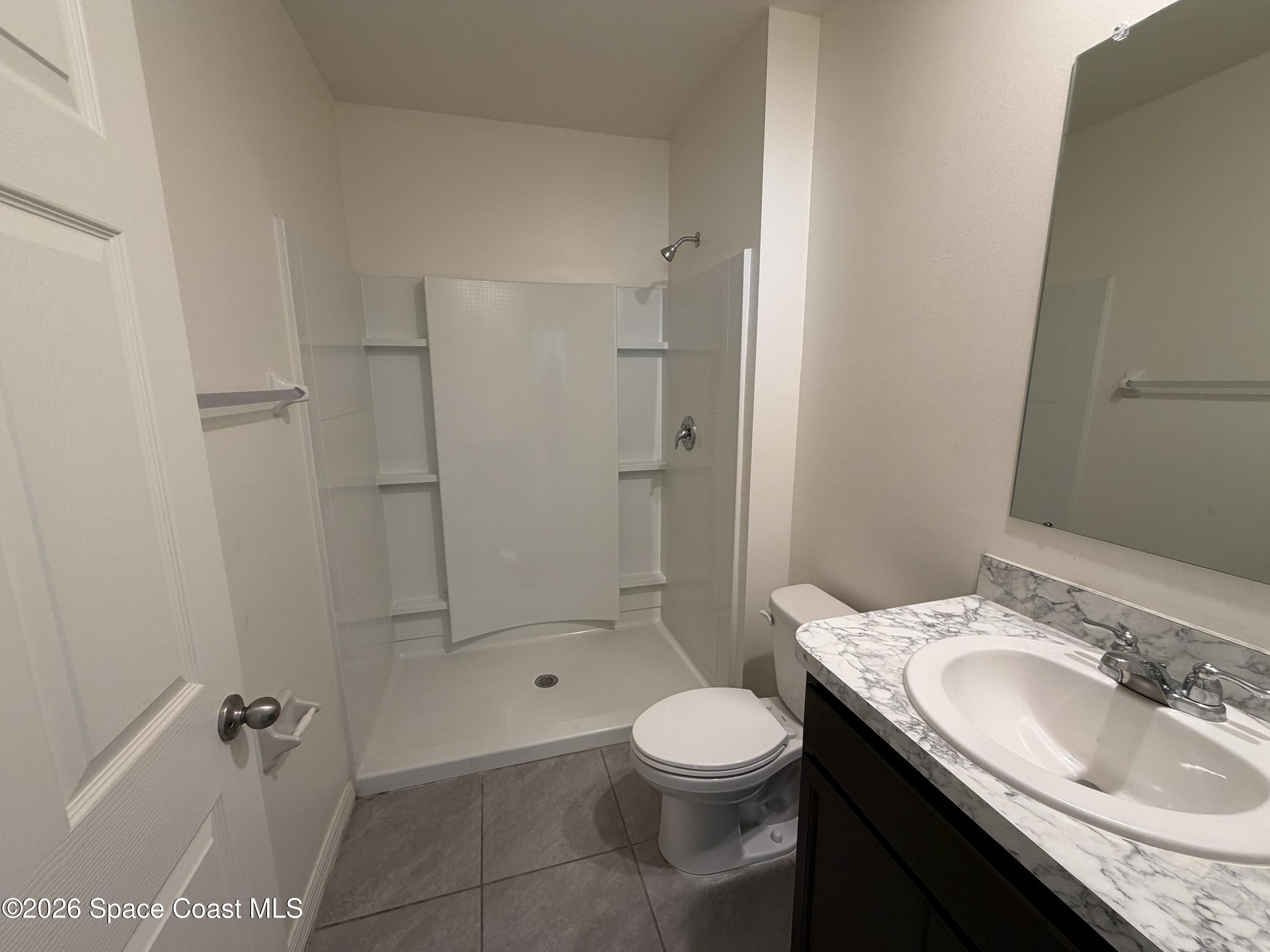 966 Trinity Street Rockledge, FL 32955 - Photo 6 of 14 Downstairs Bathroom