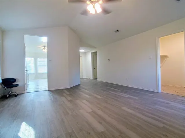 a view of livingroom and hardwood floor
