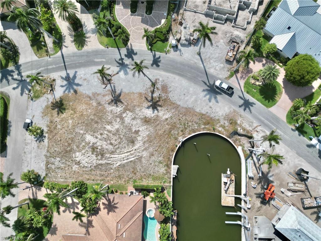 2001 Kingfish Road Naples, FL 34102 - Photo 22 of 24 an aerial view of a house with a yard