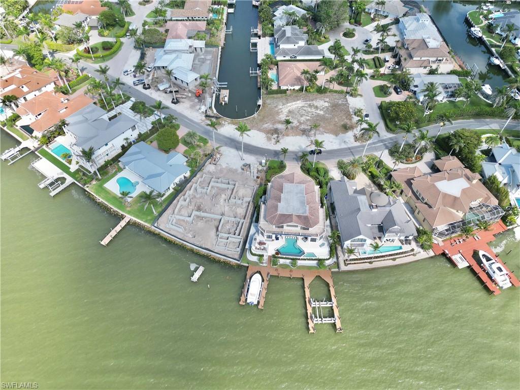 2001 Kingfish Road Naples, FL 34102 - Photo 3 of 24 an aerial view of residential houses with outdoor space