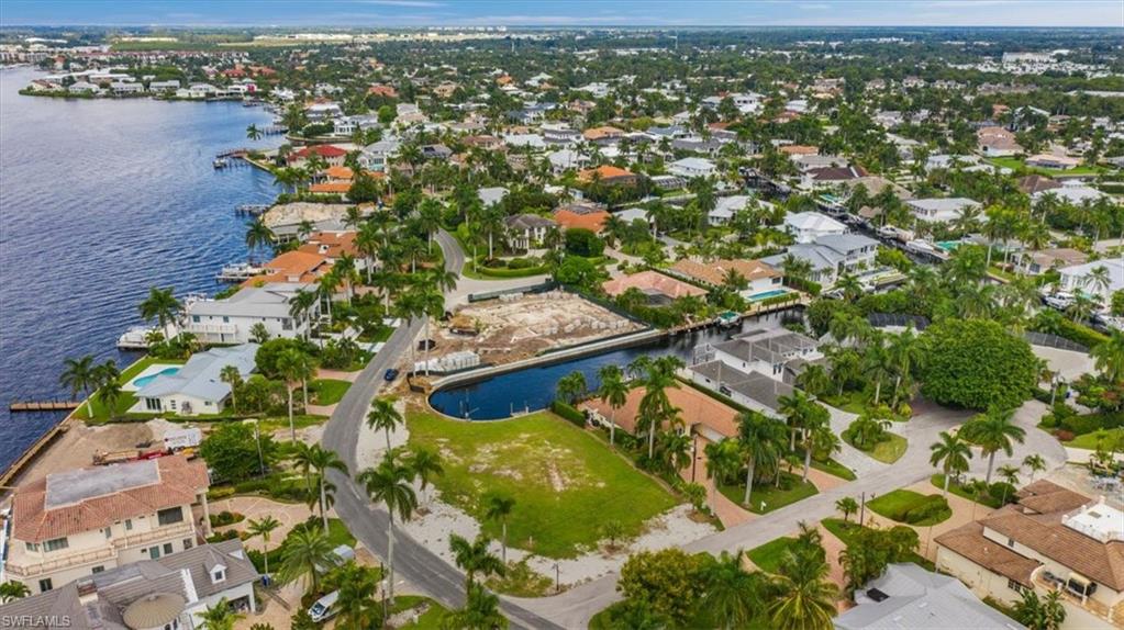 2001 Kingfish Road Naples, FL 34102 - Photo 8 of 24 an aerial view of residential houses with outdoor space