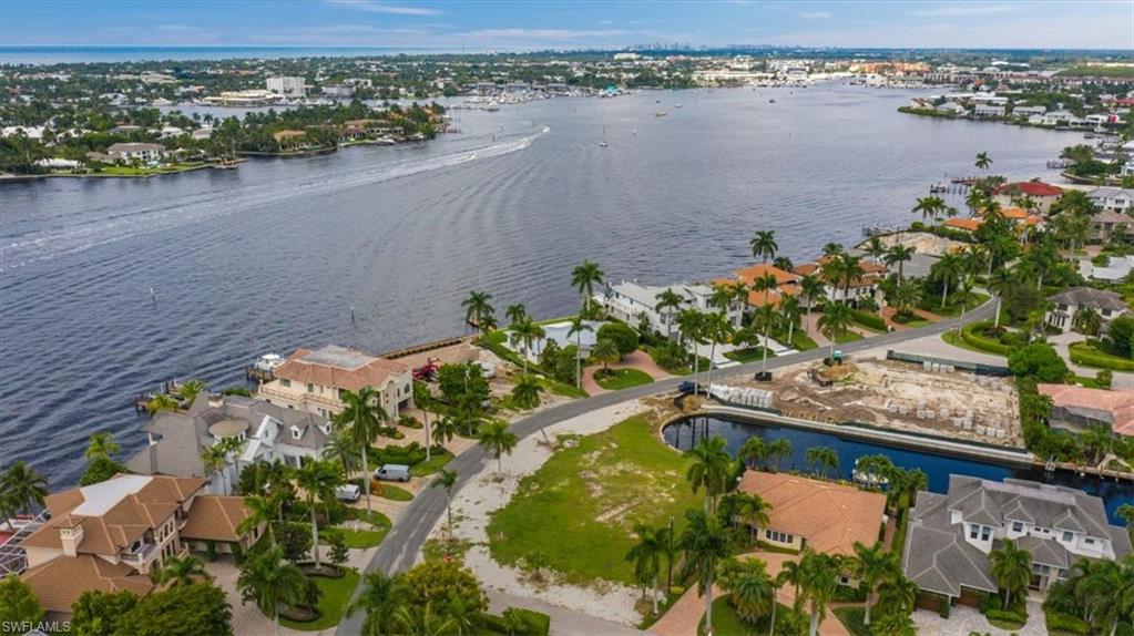 2001 Kingfish Road Naples, FL 34102 - Photo 9 of 24 a view of a lake