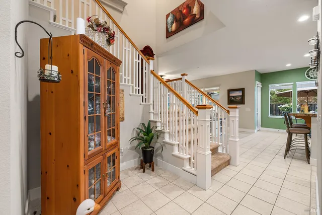 a living room with furniture and flat screen tv