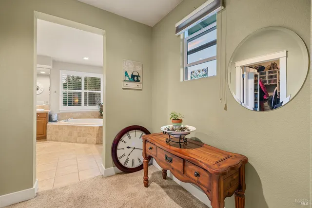 a view of a hallway with closet