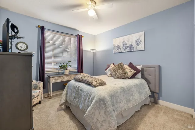 an aerial view of a house with a lake view