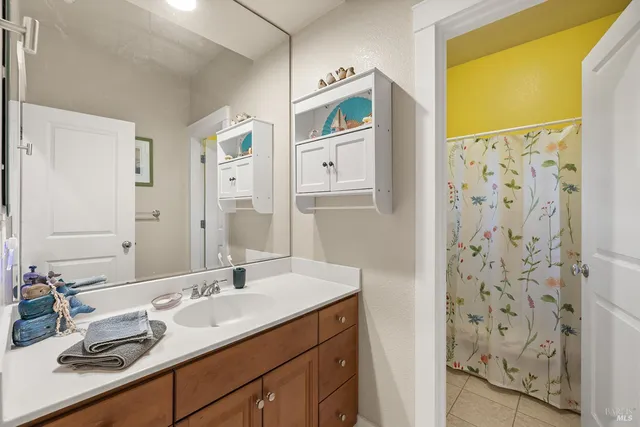 an aerial view of a house with a lake view