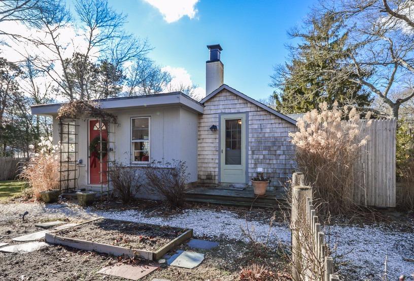59 Lewis Pond Road Cotuit, MA 02635 - Photo 2 of 24 a view of a house with a yard