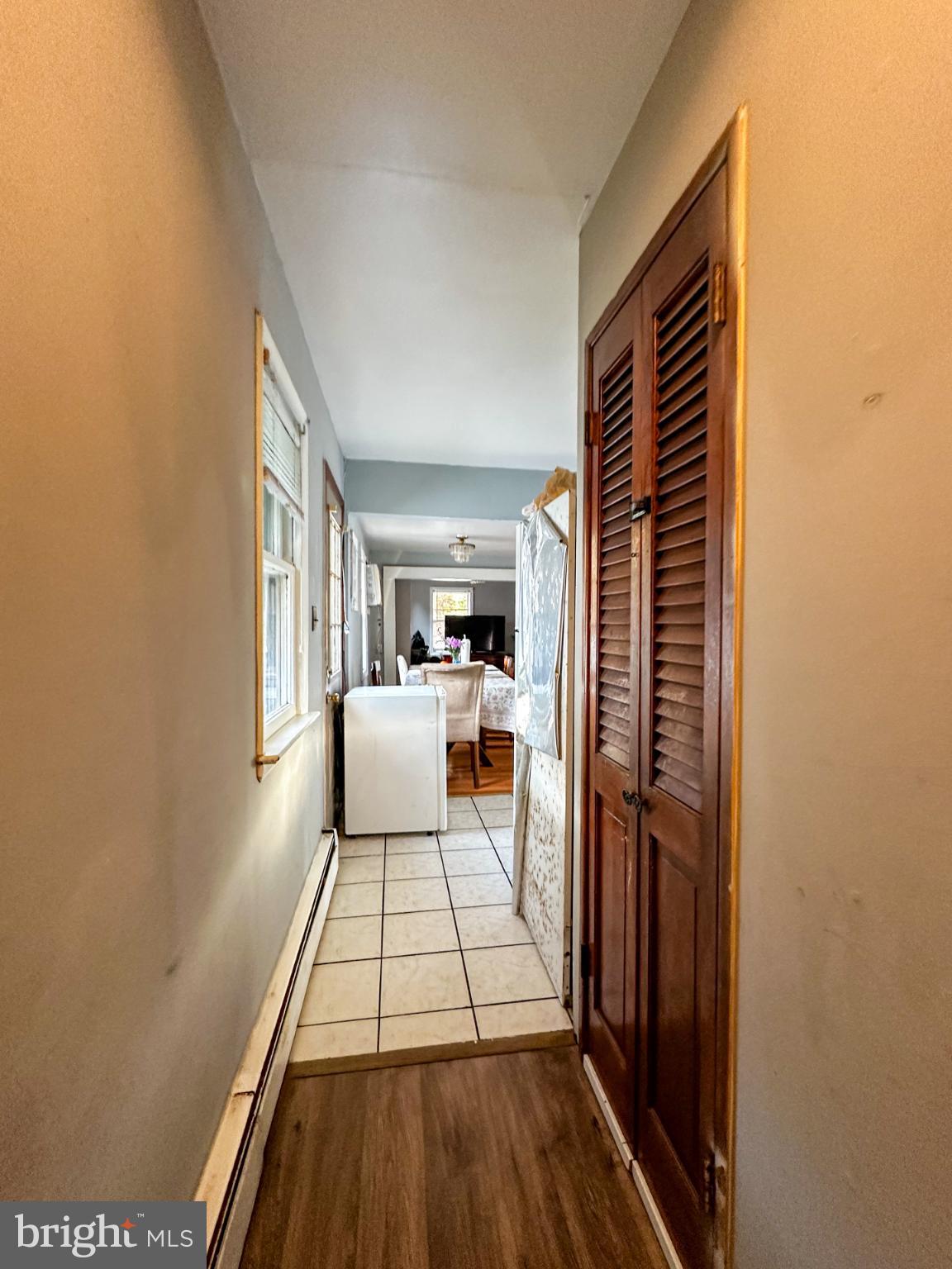 910 Magnolia Avenue Croydon, PA 19021 - Photo 17 of 33 Inviting hallway leading to cozy living space.
