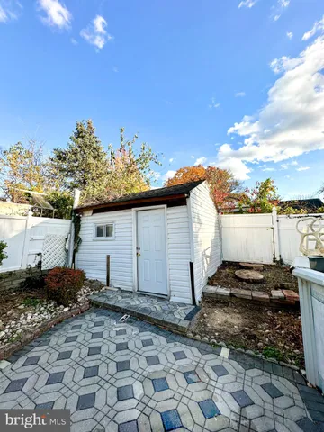 a view of a backyard of the house