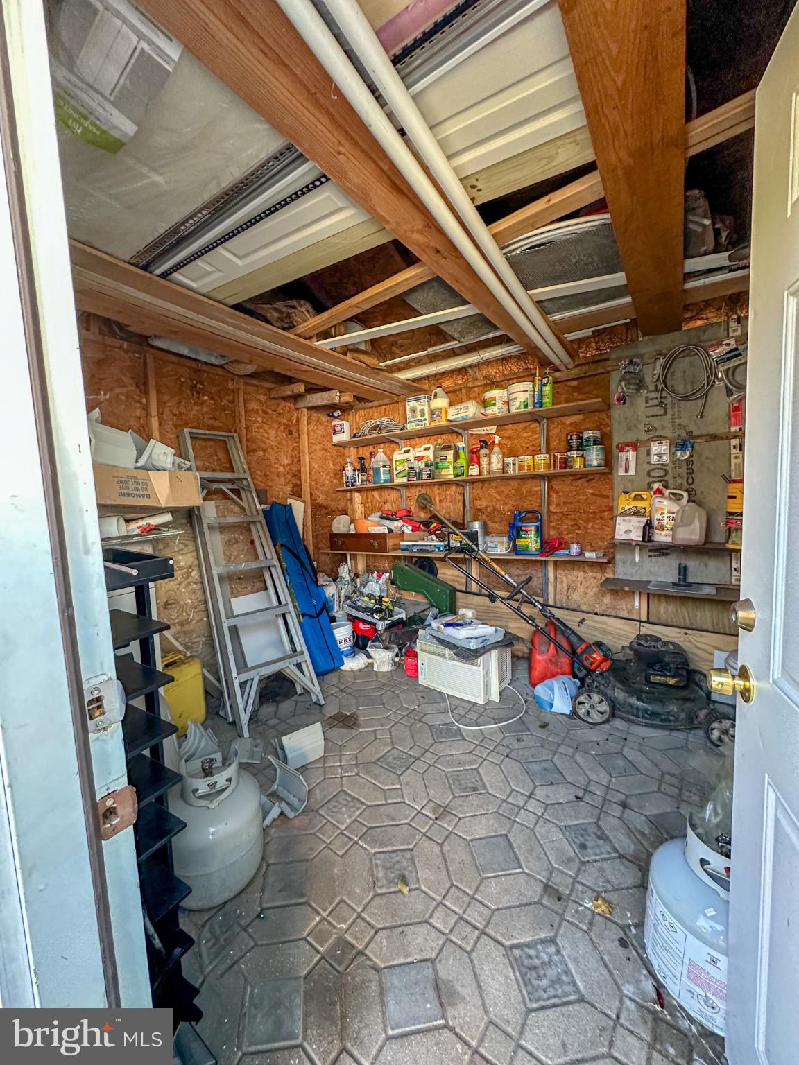 910 Magnolia Avenue Croydon, PA 19021 - Photo 28 of 33 Cluttered garage brimming with potential.