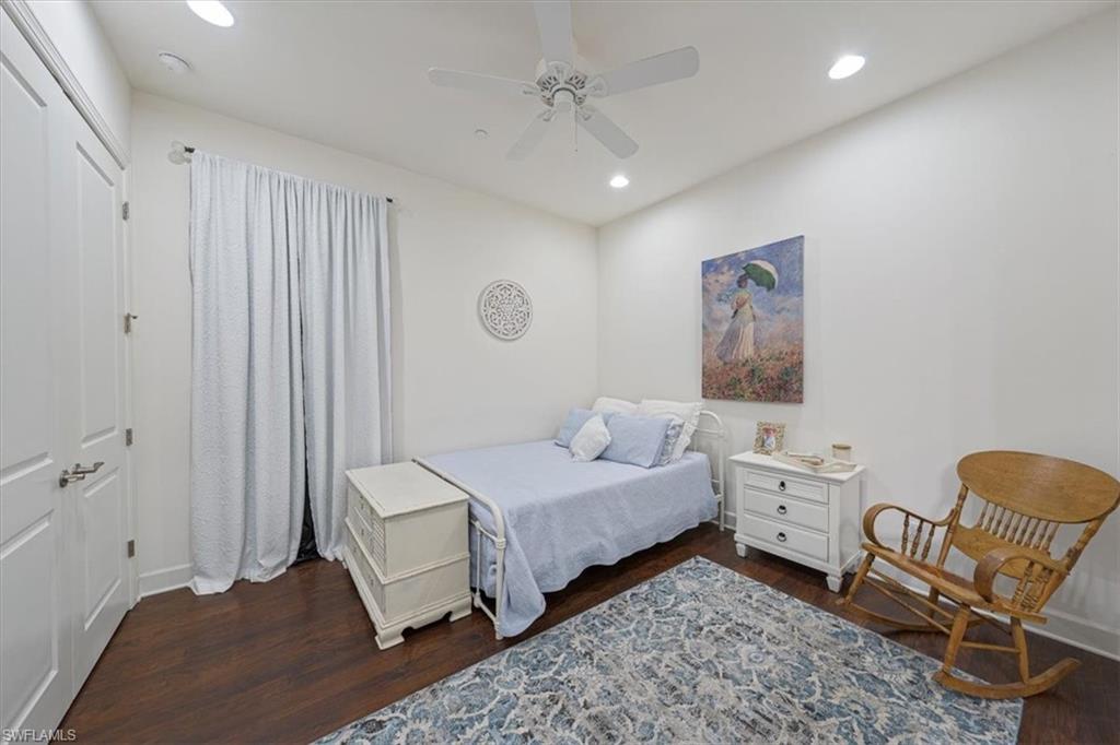 23734 Pebble Pointe Lane Estero, FL 34135 - Photo 16 of 34 a bedroom with a bed and a window