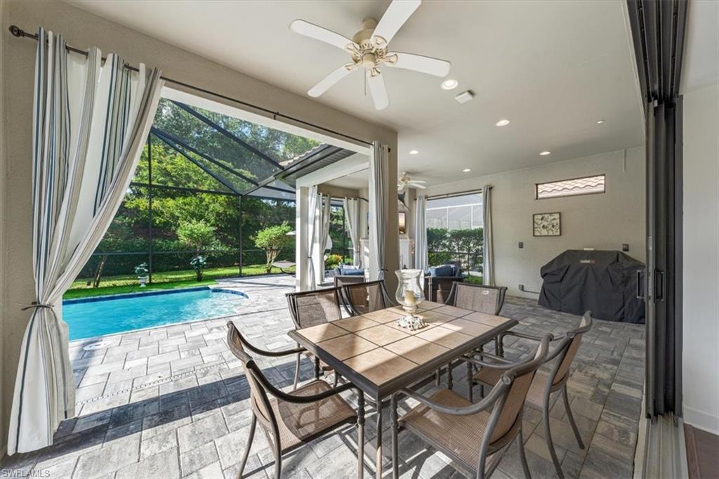 23734 Pebble Pointe Lane Estero, FL 34135 - Photo 27 of 34 a view of a dining room with furniture window and outside view