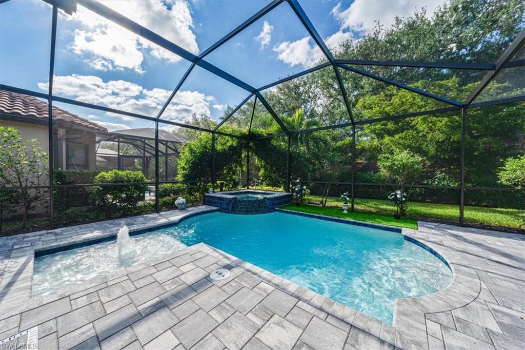 23734 Pebble Pointe Lane Estero, FL 34135 - Photo 29 of 34 a view of yard with swimming pool