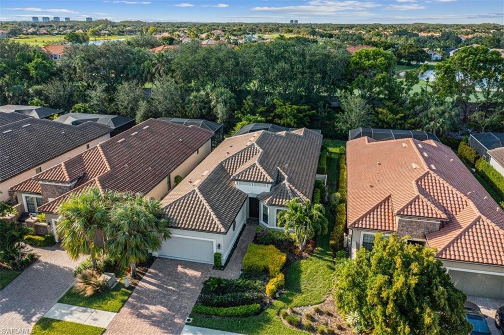 23734 Pebble Pointe Lane Estero, FL 34135 - Photo 31 of 34 an aerial view of a house