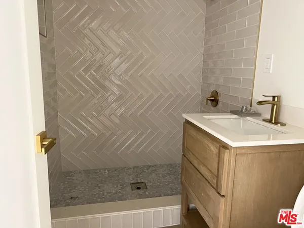 a bathroom with a sink and a bathtub