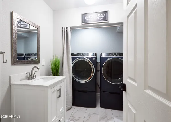 a view of a swimming pool with seating area