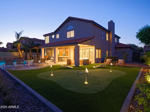 a swimming pool with barbeque oven