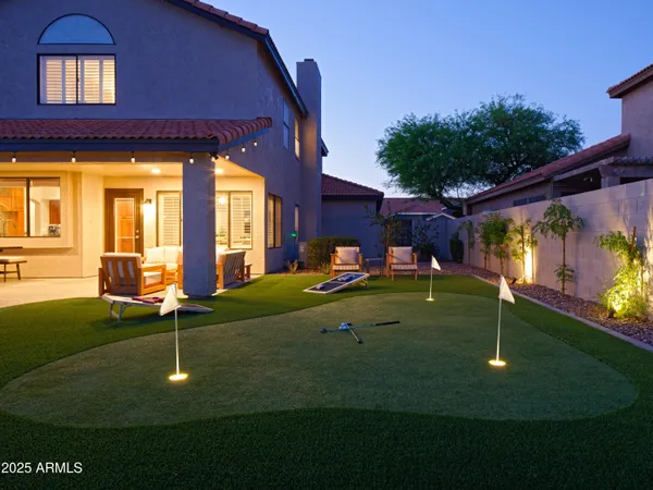 a backyard of a house with lots of green space