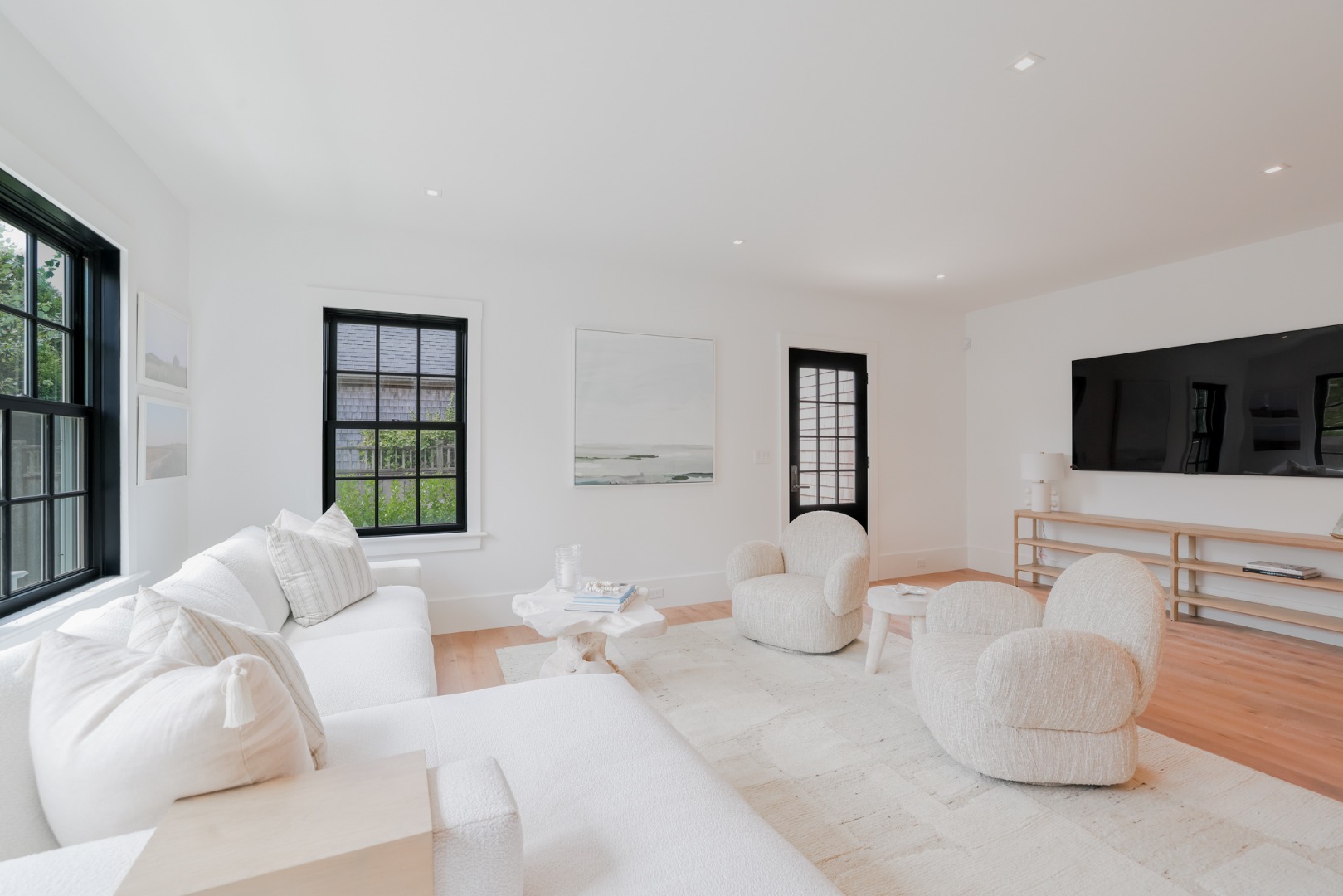 12 Derrymore Road Nantucket, MA 02554 - Photo 21 of 35 a living room with furniture and a flat screen tv