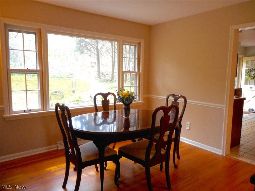 856 Old Spring Road Akron, OH 44321 - Photo 11 of 30 The dining room is freshly painted and has a large picture window to view the gorgeous treed backyard.