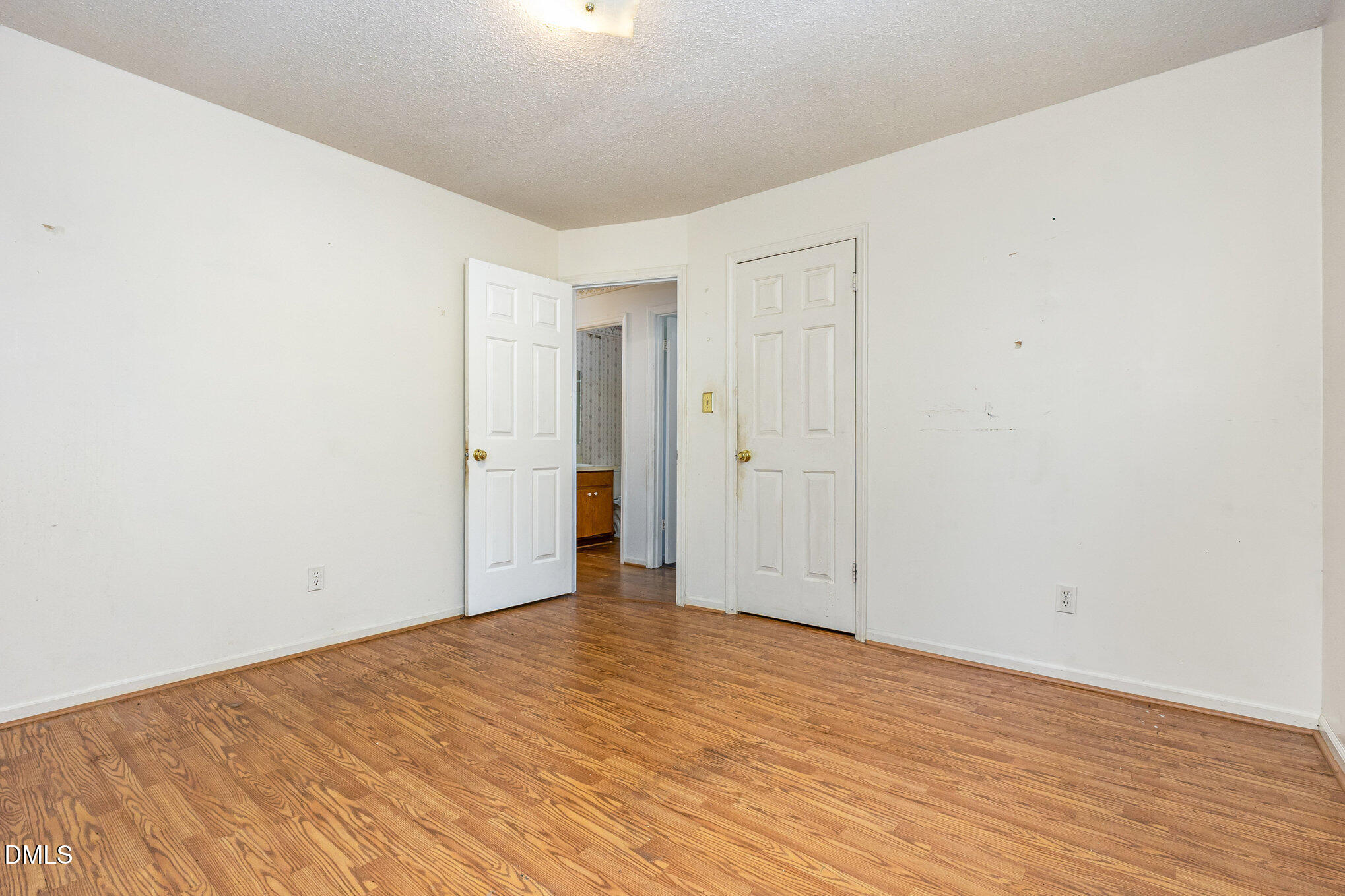 2111 Fieldcrest Road East Wilson, NC 27893 - Photo 19 of 37 wooden floor in an empty room